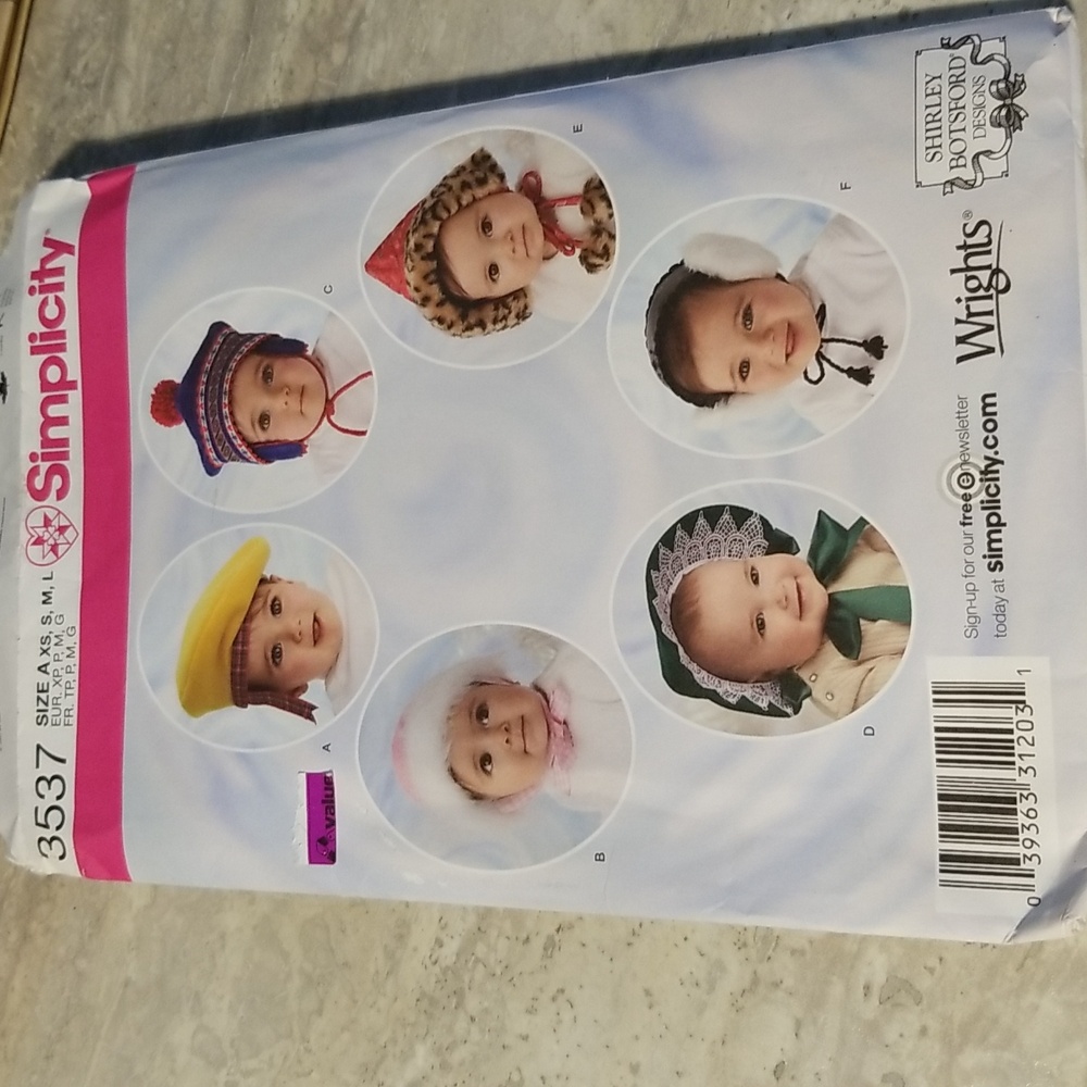 Uncut Simplicity pattern #3537 baby/doll hats